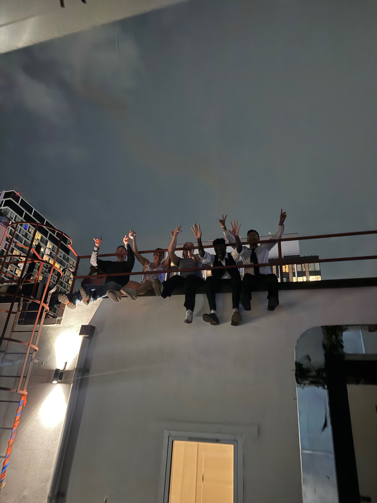 DRIVE team rooftop celebration
